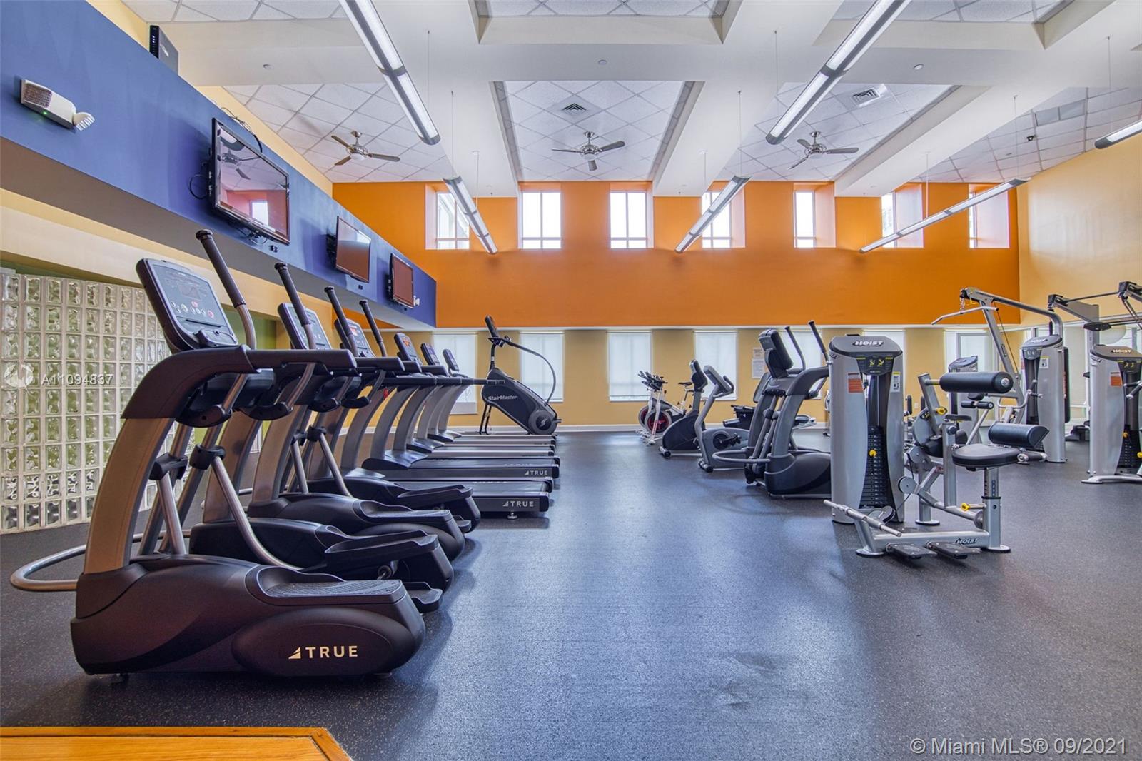 7355 Southwest 89th Street, Unit 425N Miami, FL 33156 - Photo 20 of 22 a view of a room with gym equipment