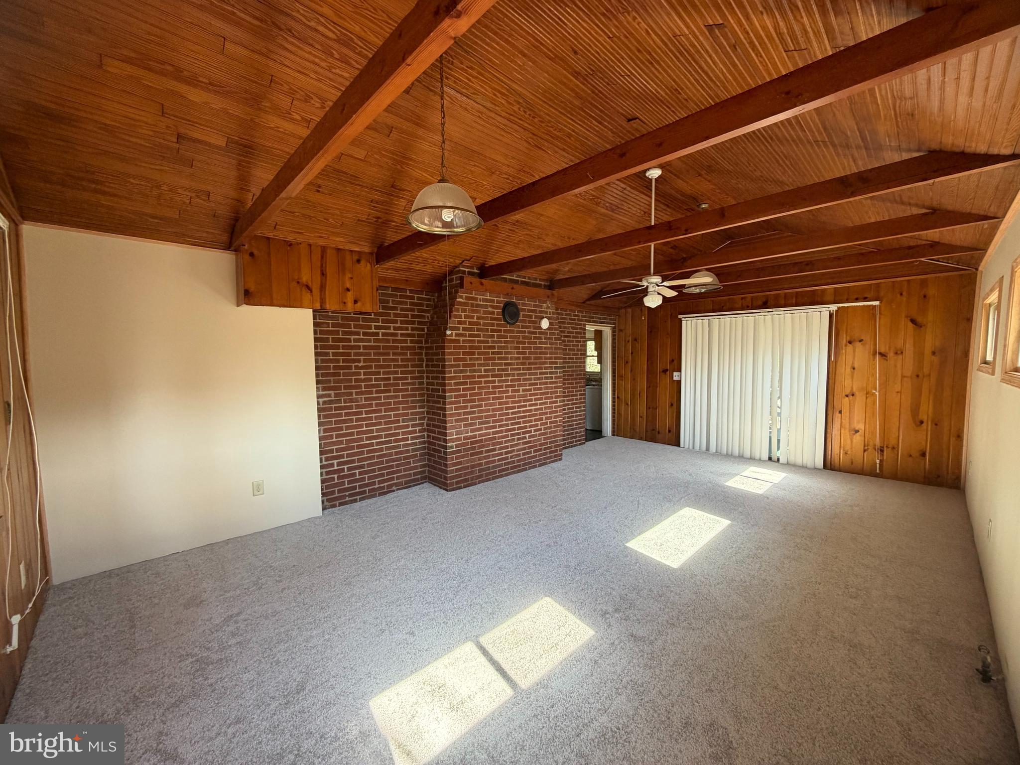7819 McLean Street Manassas, VA 20111 - Photo 9 of 27 Family room with sliding glass door to rear porch.