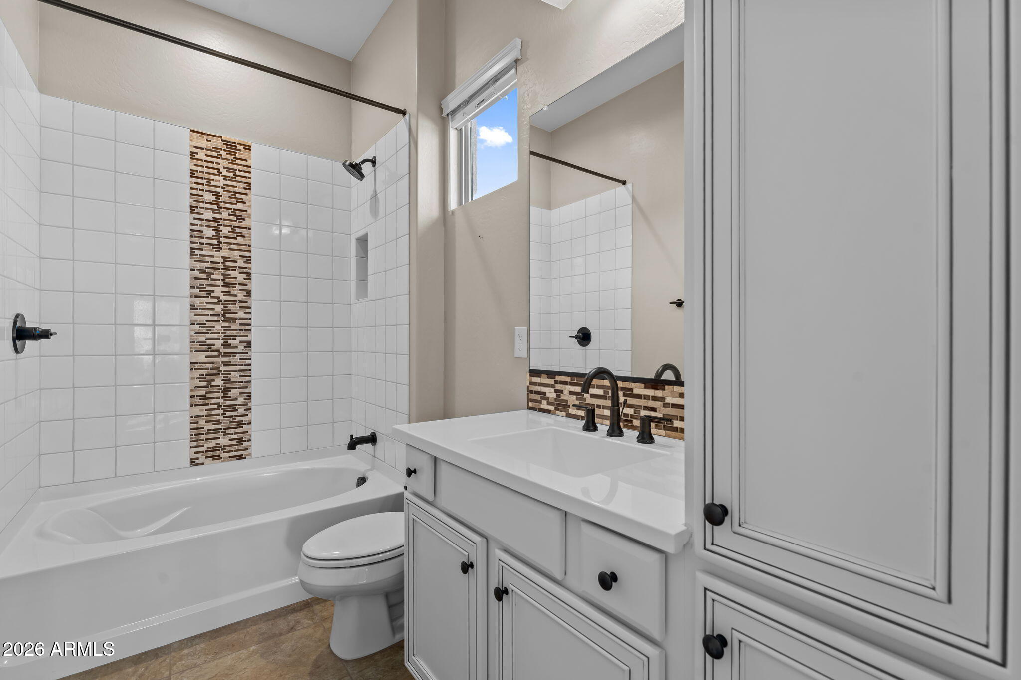 3675 Gold Ridge Road Wickenburg, AZ 85390 - Photo 27 of 58 a bathroom with a sink toilet vanity and shower