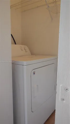 a bathroom with a toilet and a bathtub