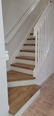 a front view of a house with garage