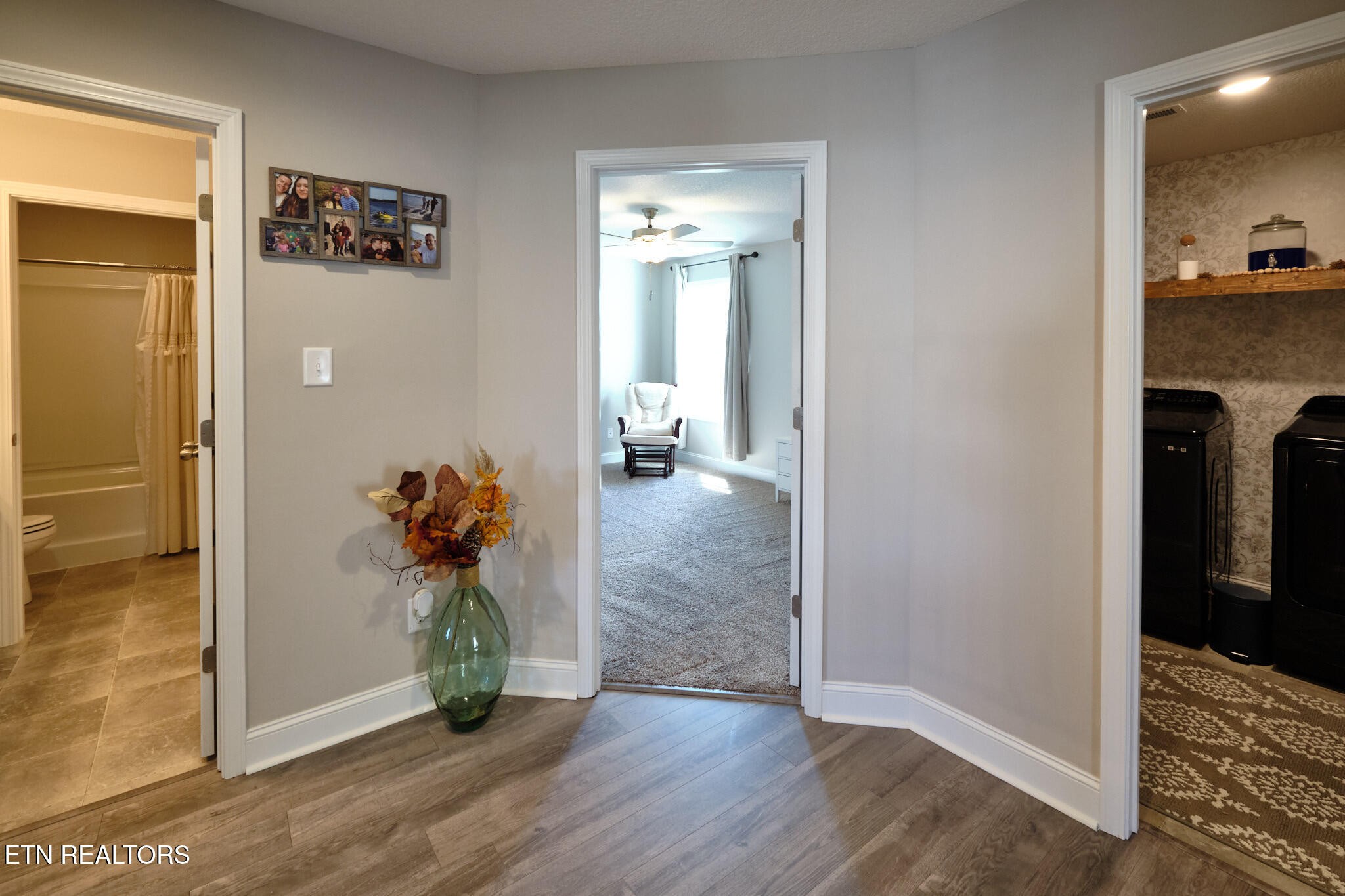 8155 Zenith Lane Powell, TN 37849 - Photo 21 of 45 a view of a hallway view with wooden floor and dining room