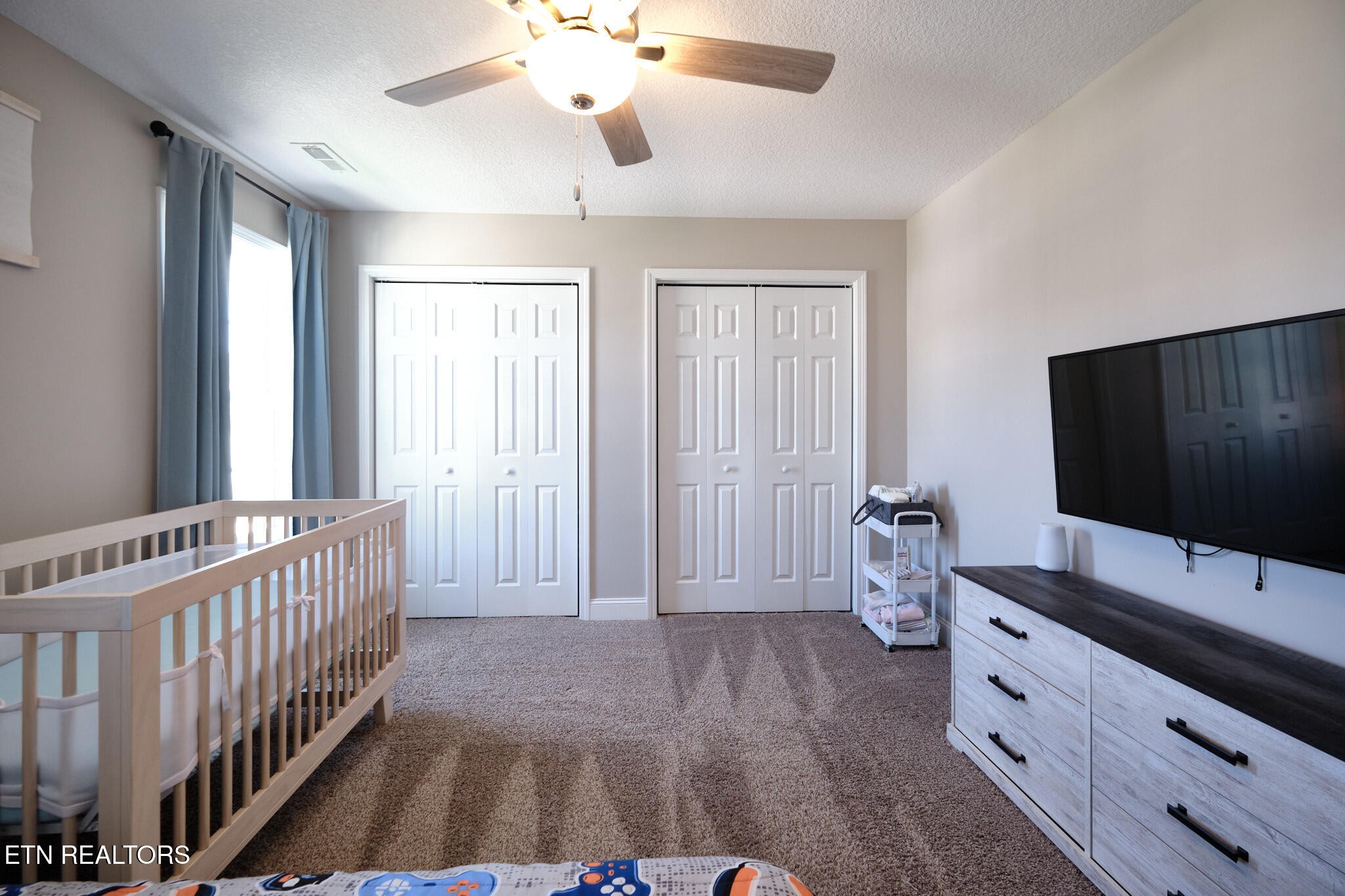 8155 Zenith Lane Powell, TN 37849 - Photo 32 of 45 a view of an bedroom with furniture and windows