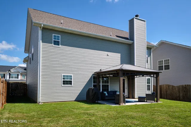 a view of a house with a garden
