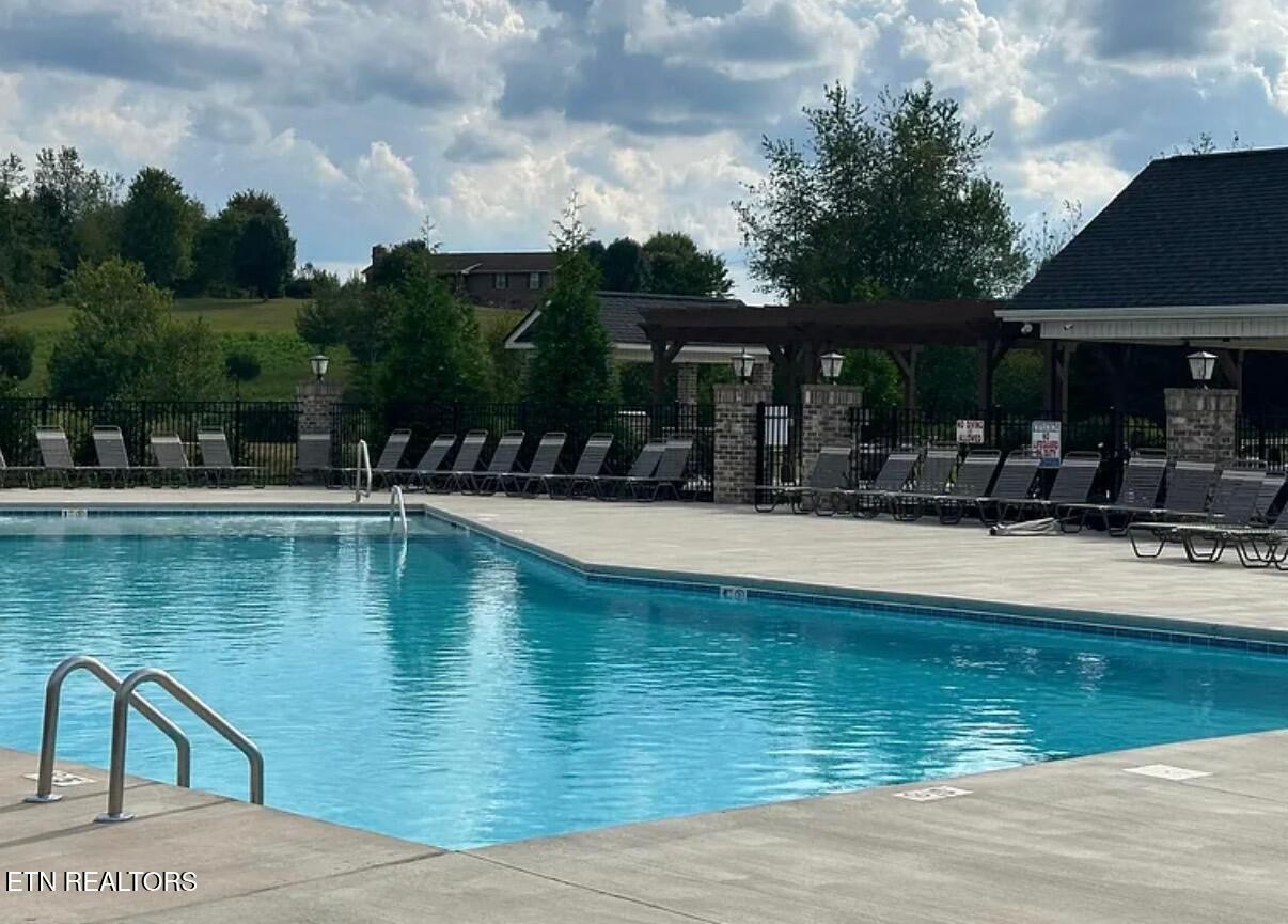 8155 Zenith Lane Powell, TN 37849 - Photo 42 of 45 a swimming pool view with a outdoor seating