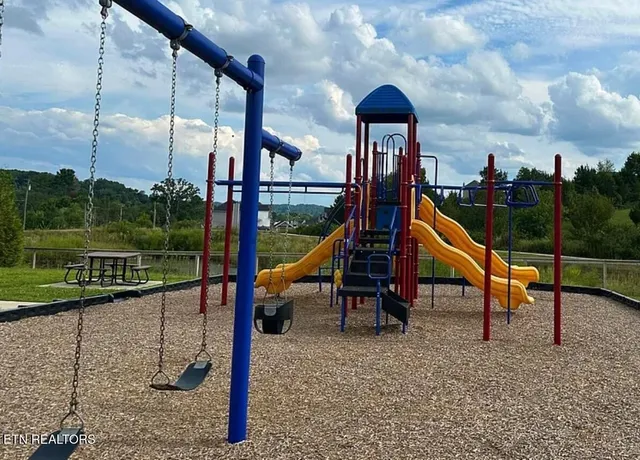 a view of a park with slide