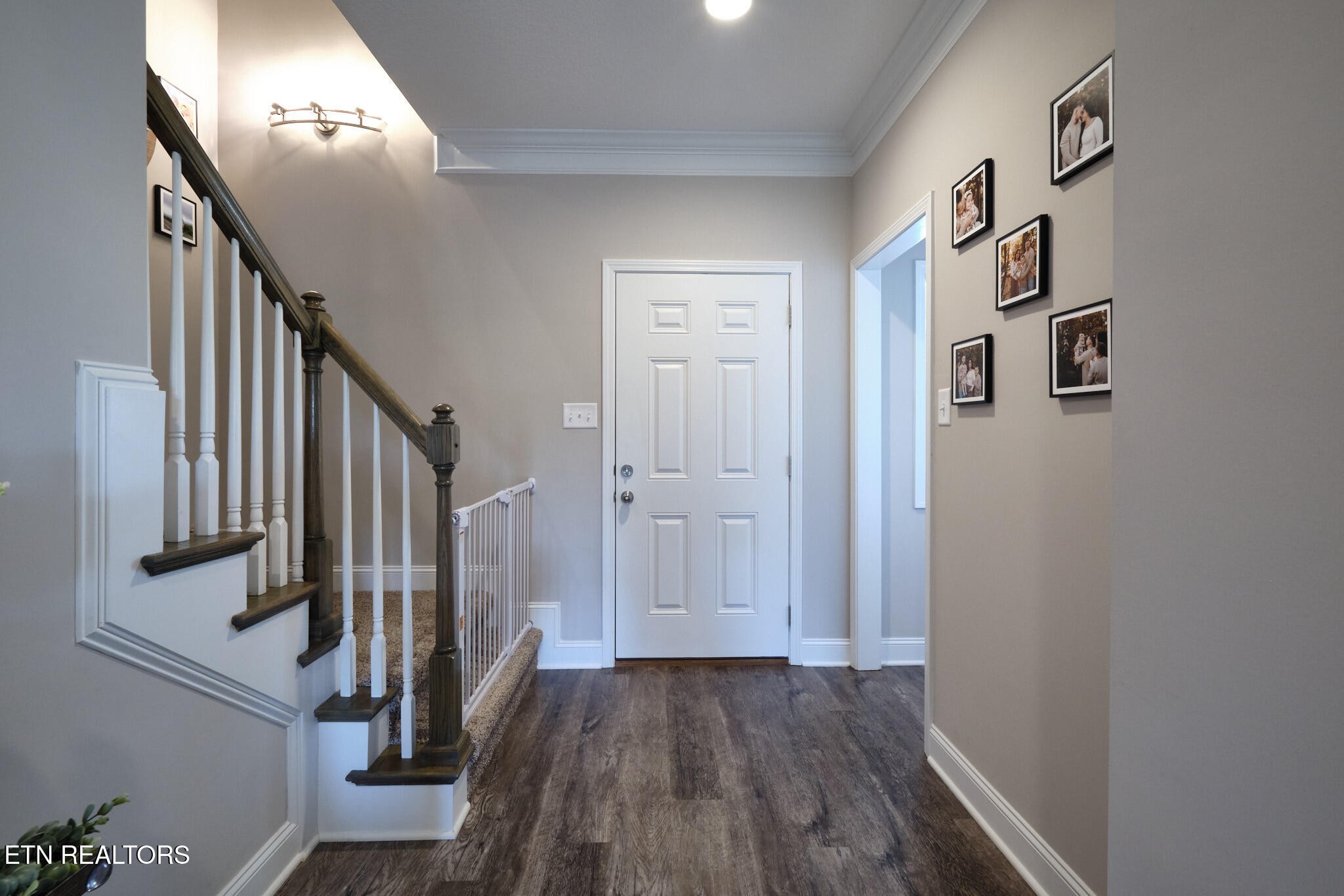 8155 Zenith Lane Powell, TN 37849 - Photo 5 of 45 a view of a hallway with wooden floor and entryway