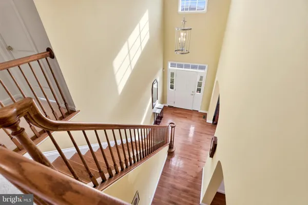 a view of a balcony with wooden floor