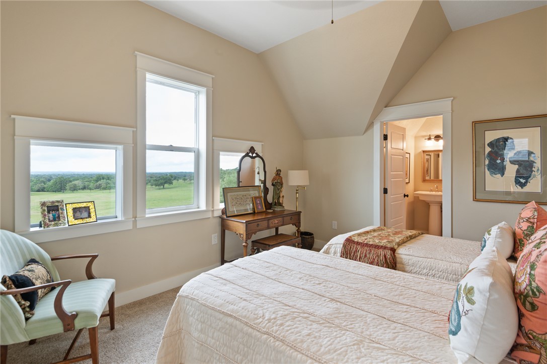 4046 Fm 1361 Somerville, TX 77879 - Photo 14 of 18 a bedroom with a large bed and a large window