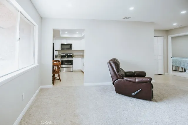 a room with furniture and a chair