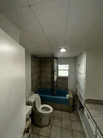 a view of gallery with wooden floor