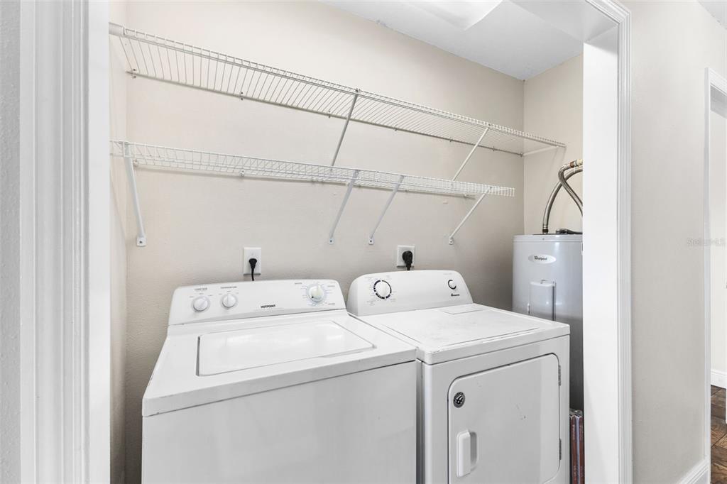445 Horseshoe Loop Road Terra Ceia, FL 34250 - Photo 17 of 65 a utility room with dryer and washer