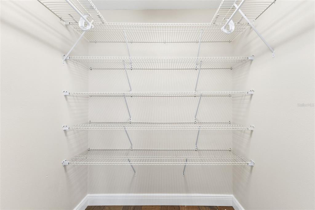 445 Horseshoe Loop Road Terra Ceia, FL 34250 - Photo 24 of 65 a view of a room with racks on the wall