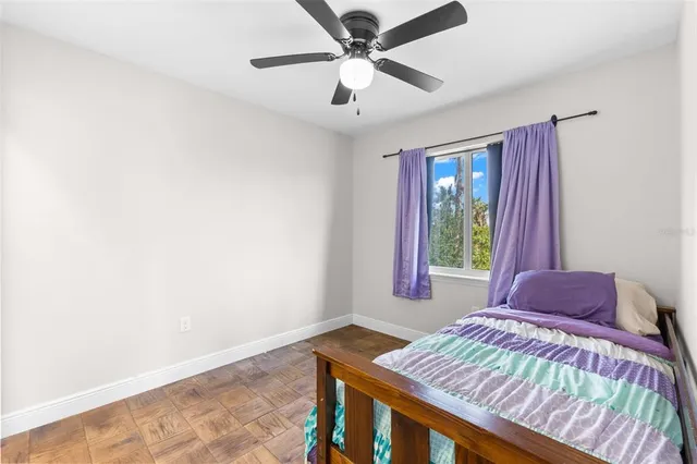 a kitchen with stainless steel appliances granite countertop a refrigerator sink and stove