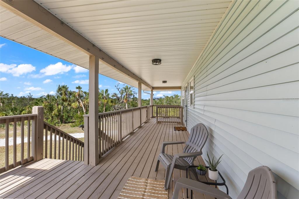 445 Horseshoe Loop Road Terra Ceia, FL 34250 - Photo 5 of 65 a view of a balcony with furniture