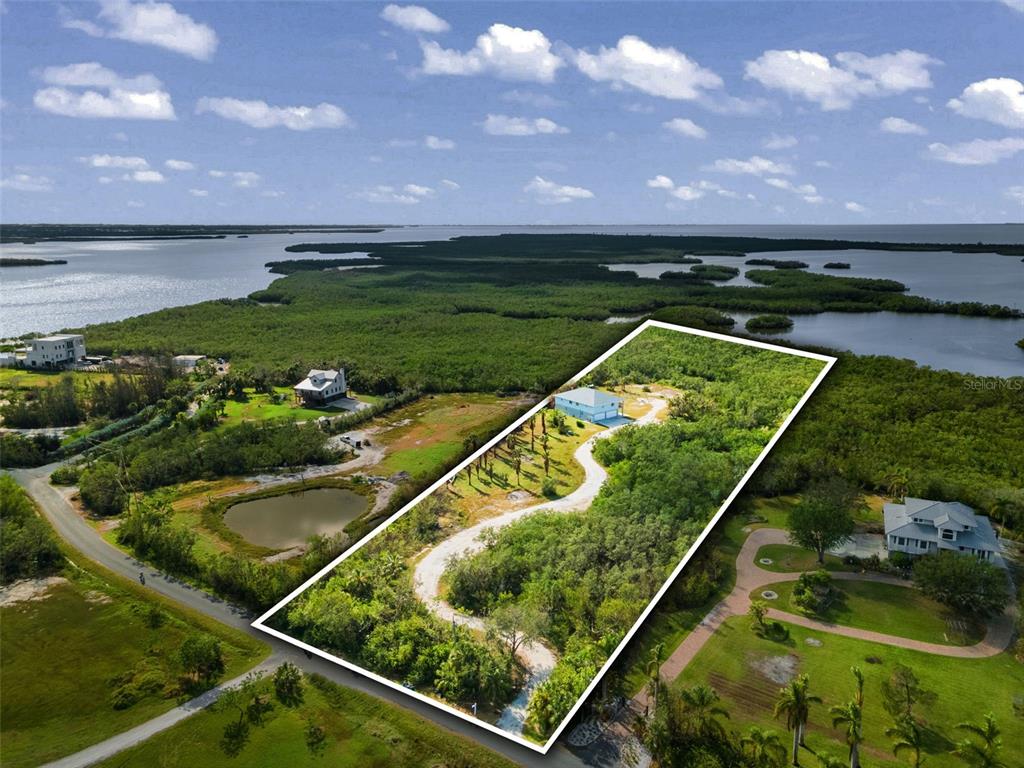 445 Horseshoe Loop Road Terra Ceia, FL 34250 - Photo 59 of 65 a view of a pool in a balcony