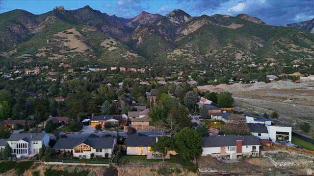 8760 Rustler Road Cottonwood Heights, UT 84093 - Photo 51 of 57 Expansive neighborhood setting featuring a mountainous backdrop, mature trees, and a variety of residential architectural styles