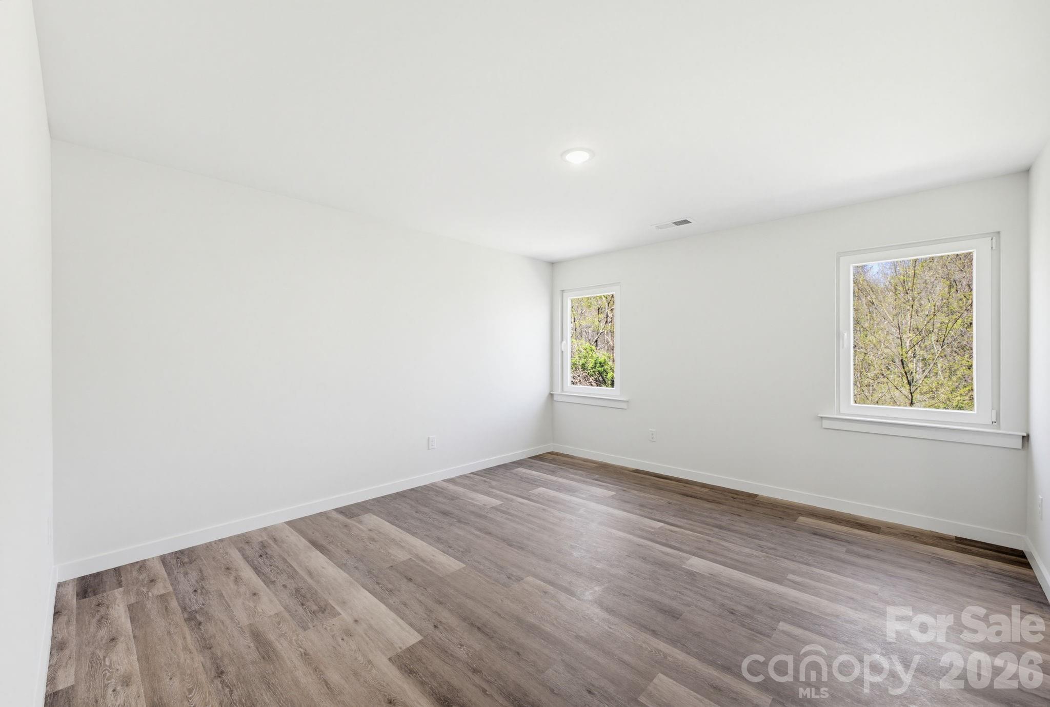 2323 Merts Way, Unit 1 Hudson, NC 28638 - Photo 10 of 15 an empty room with a window