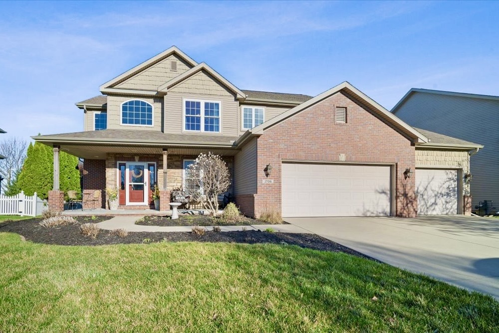 1706 Pfitzer Road Normal, IL 61761 - Photo 1 of 27 a front view of a house with a yard