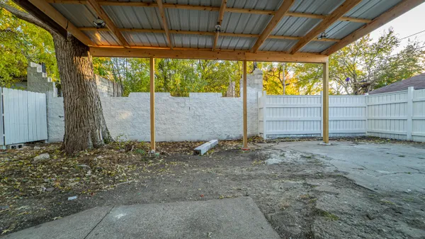 a view of a backyard with a outdoor space