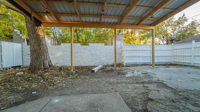 a view of a backyard with a outdoor space