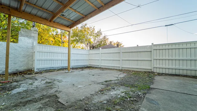 a view of a backyard of the house