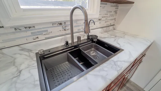 a close view of a stove top oven and sink