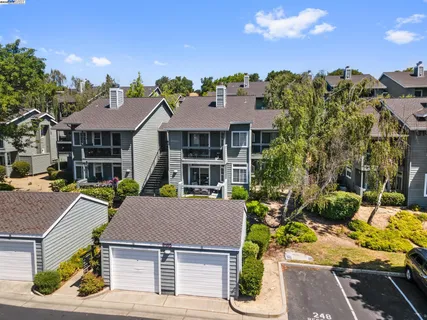 a aerial view of a house with a garden and plants