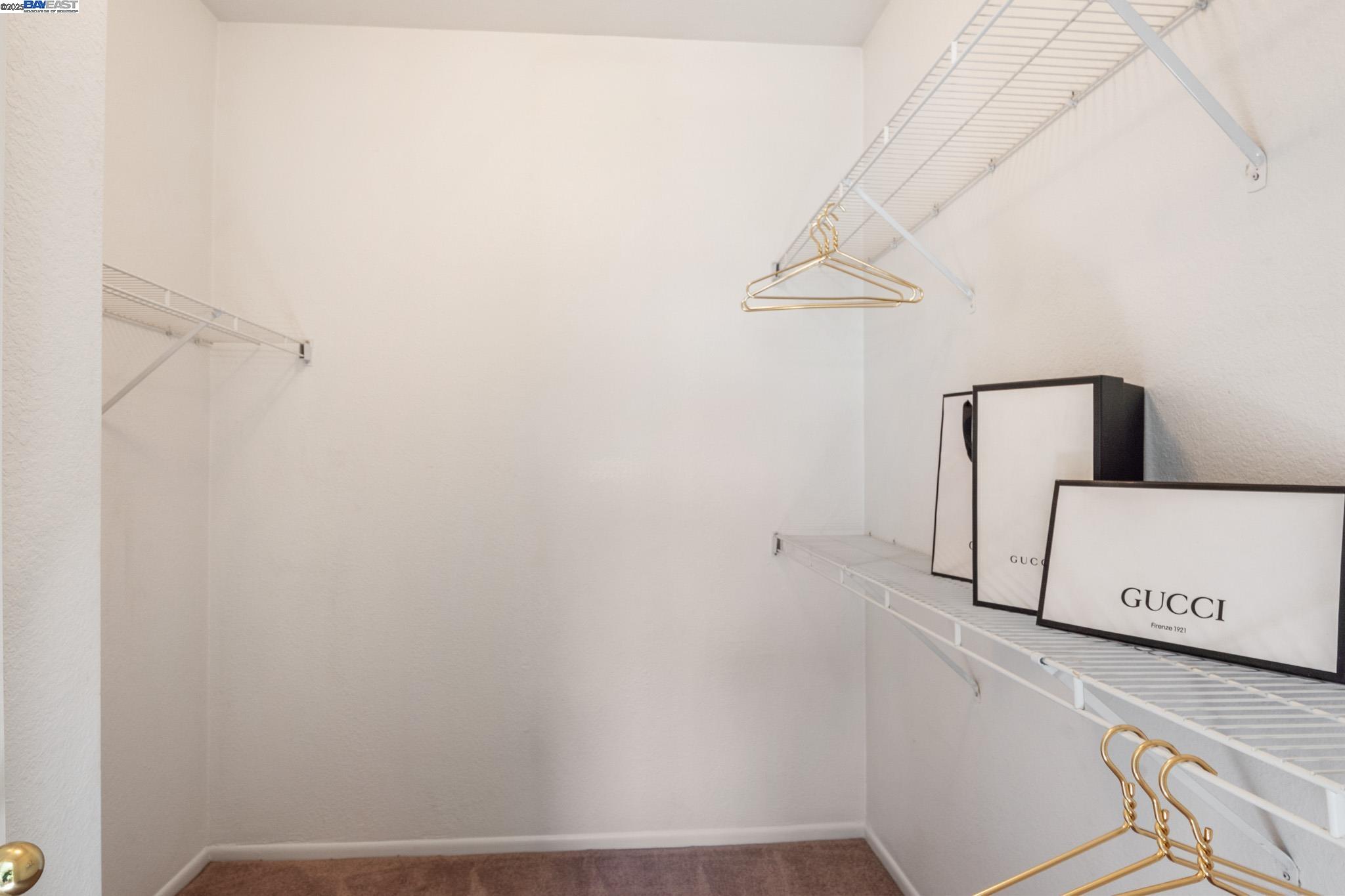 8165 Mountain View Drive, Unit C Pleasanton, CA 94588 - Photo 24 of 35 a view of a room with rack on the wall