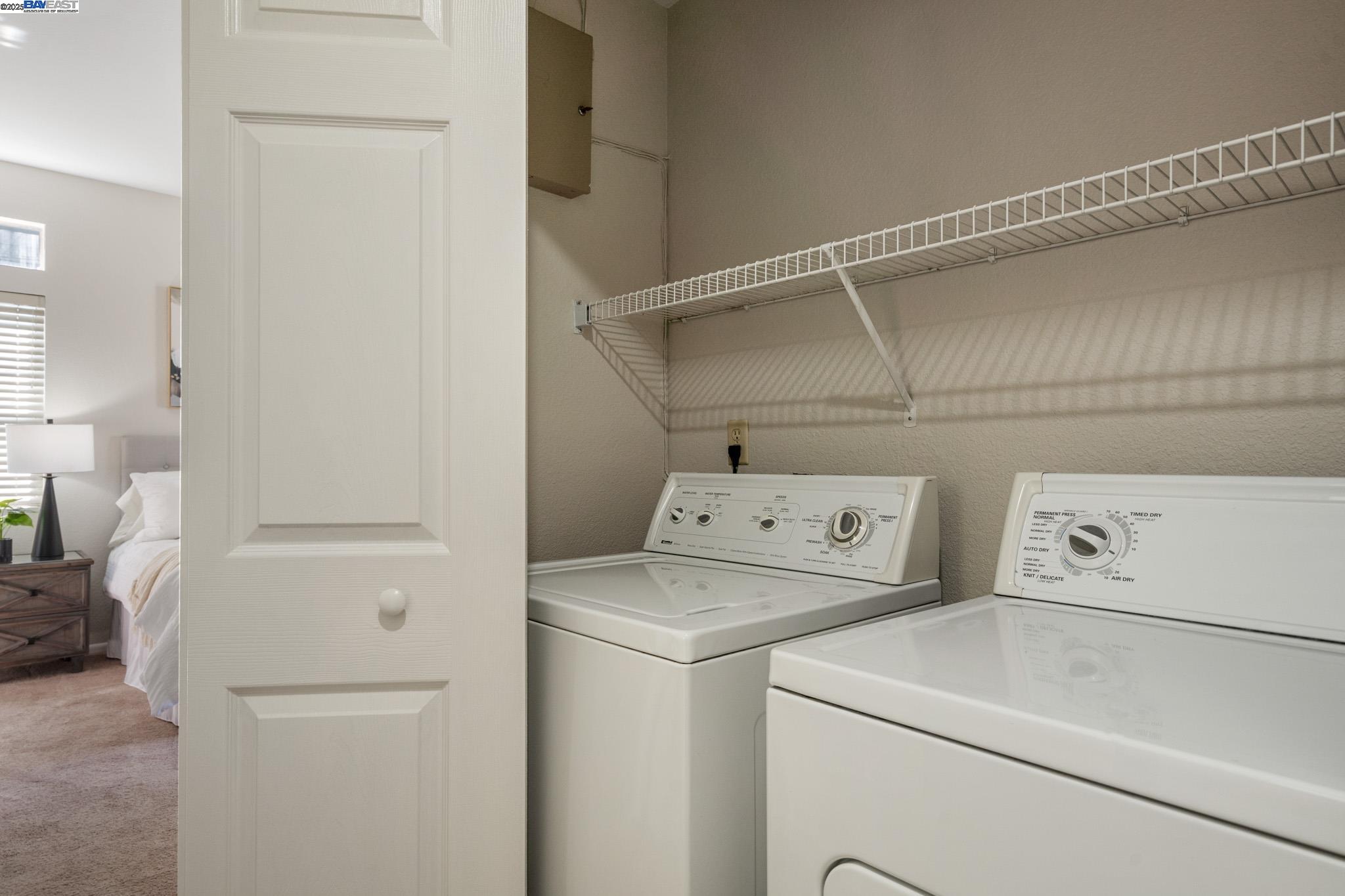 8165 Mountain View Drive, Unit C Pleasanton, CA 94588 - Photo 28 of 35 a utility room with dryer and washer
