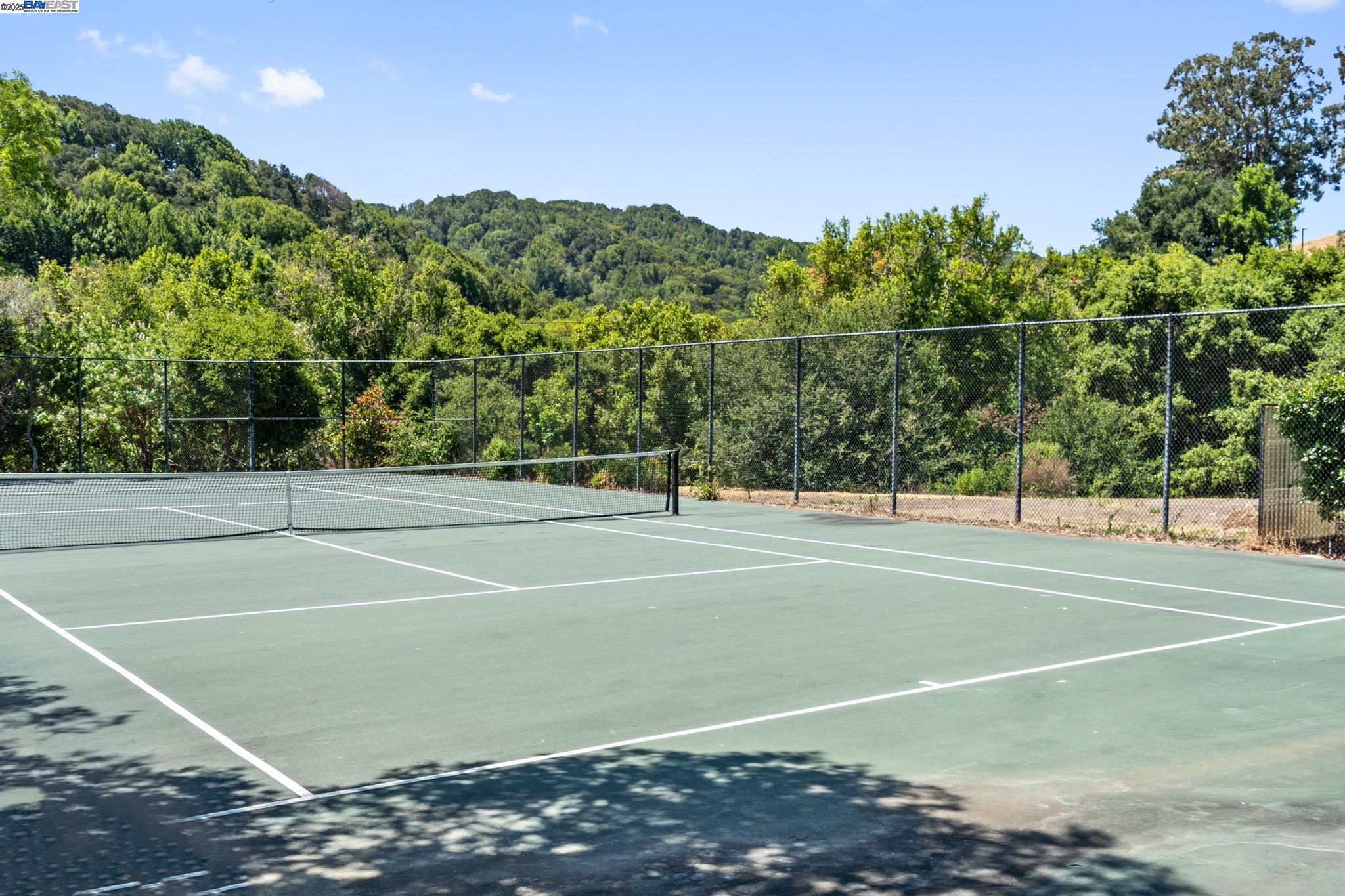 8165 Mountain View Drive, Unit C Pleasanton, CA 94588 - Photo 30 of 35 a view of a tennis court
