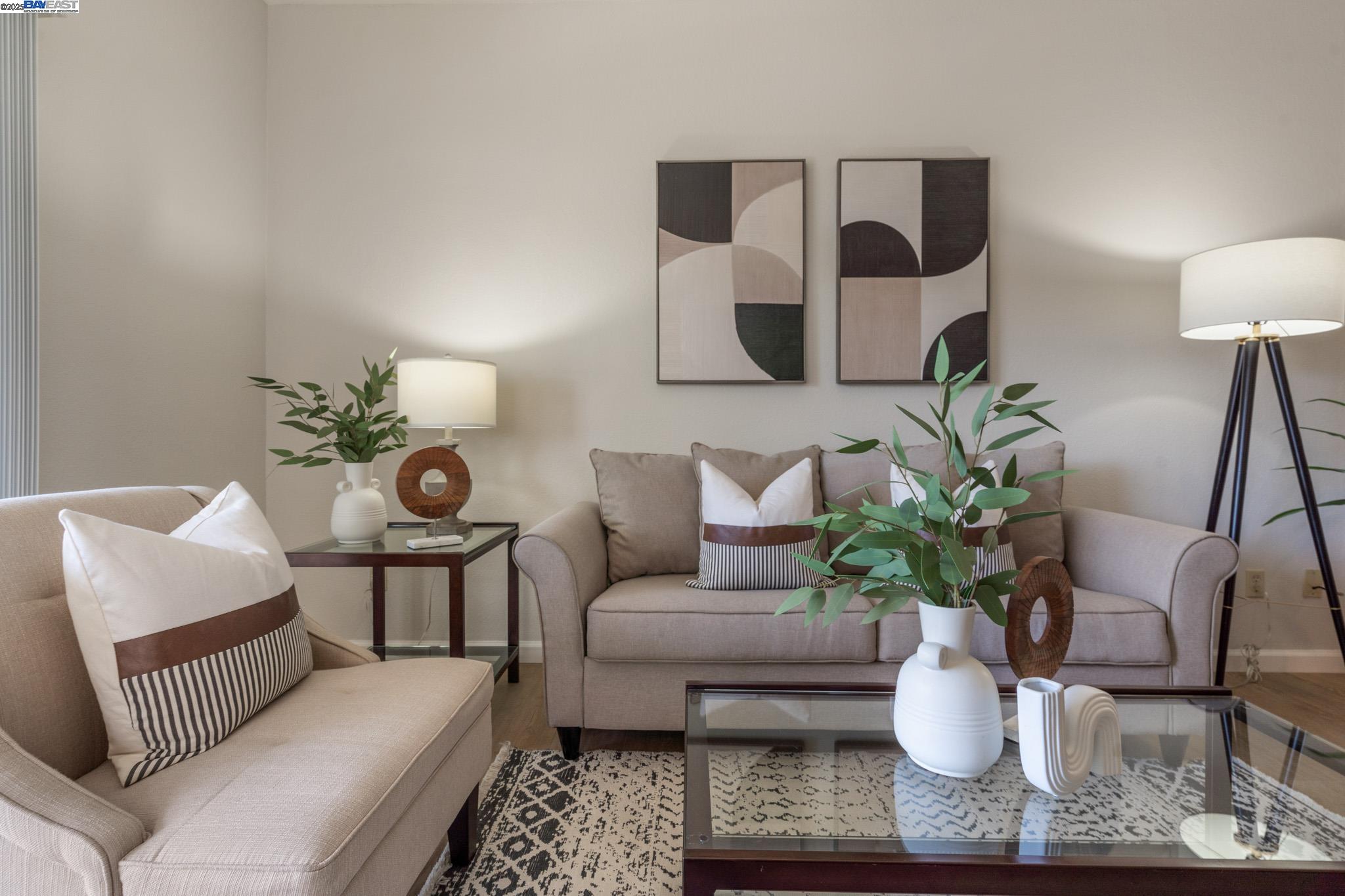 8165 Mountain View Drive, Unit C Pleasanton, CA 94588 - Photo 7 of 35 a living room with furniture and a lamp