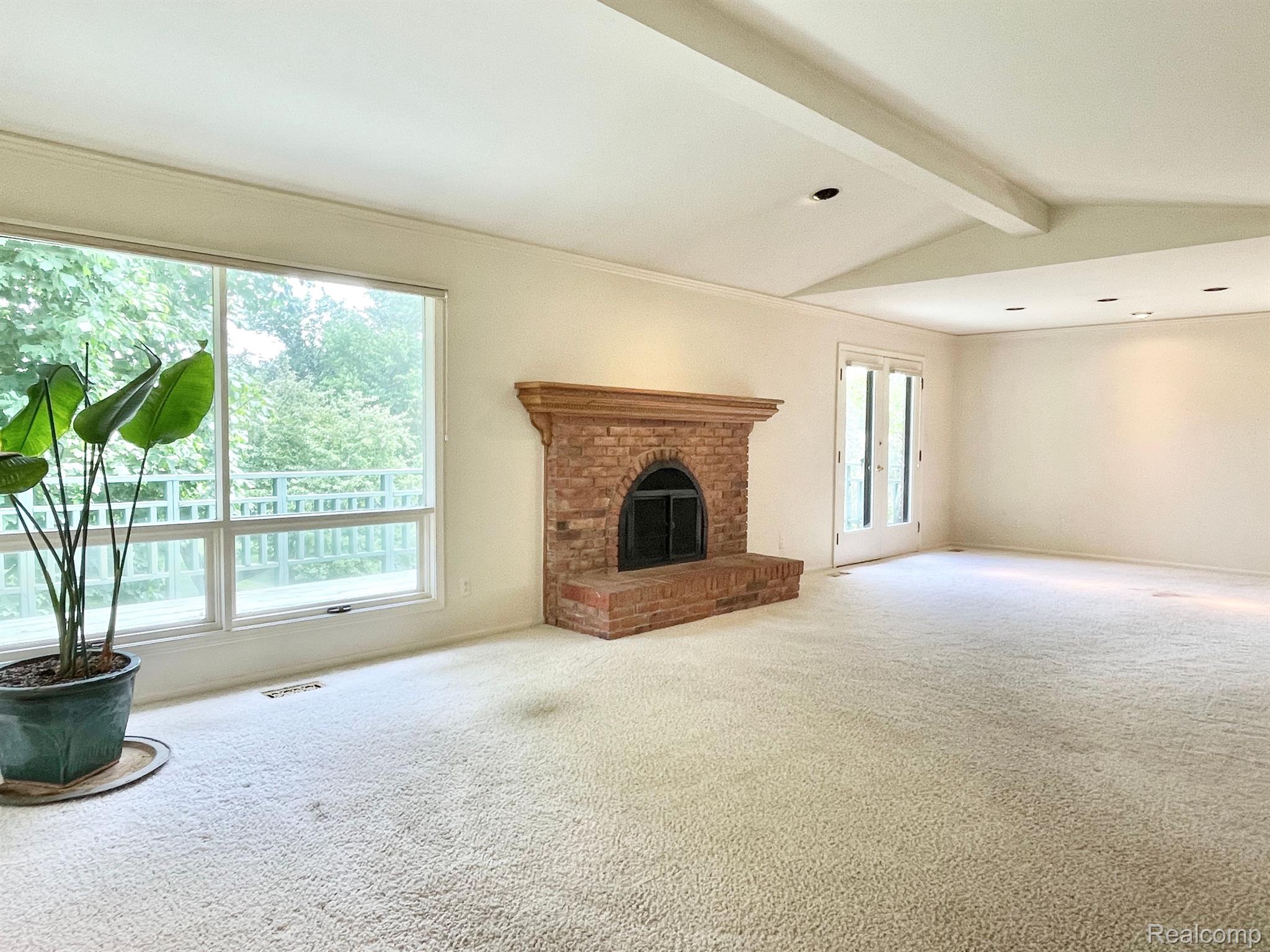 5211 Darby Circle Rochester, MI 48306 - Photo 5 of 49 Vaulted living room / dining room