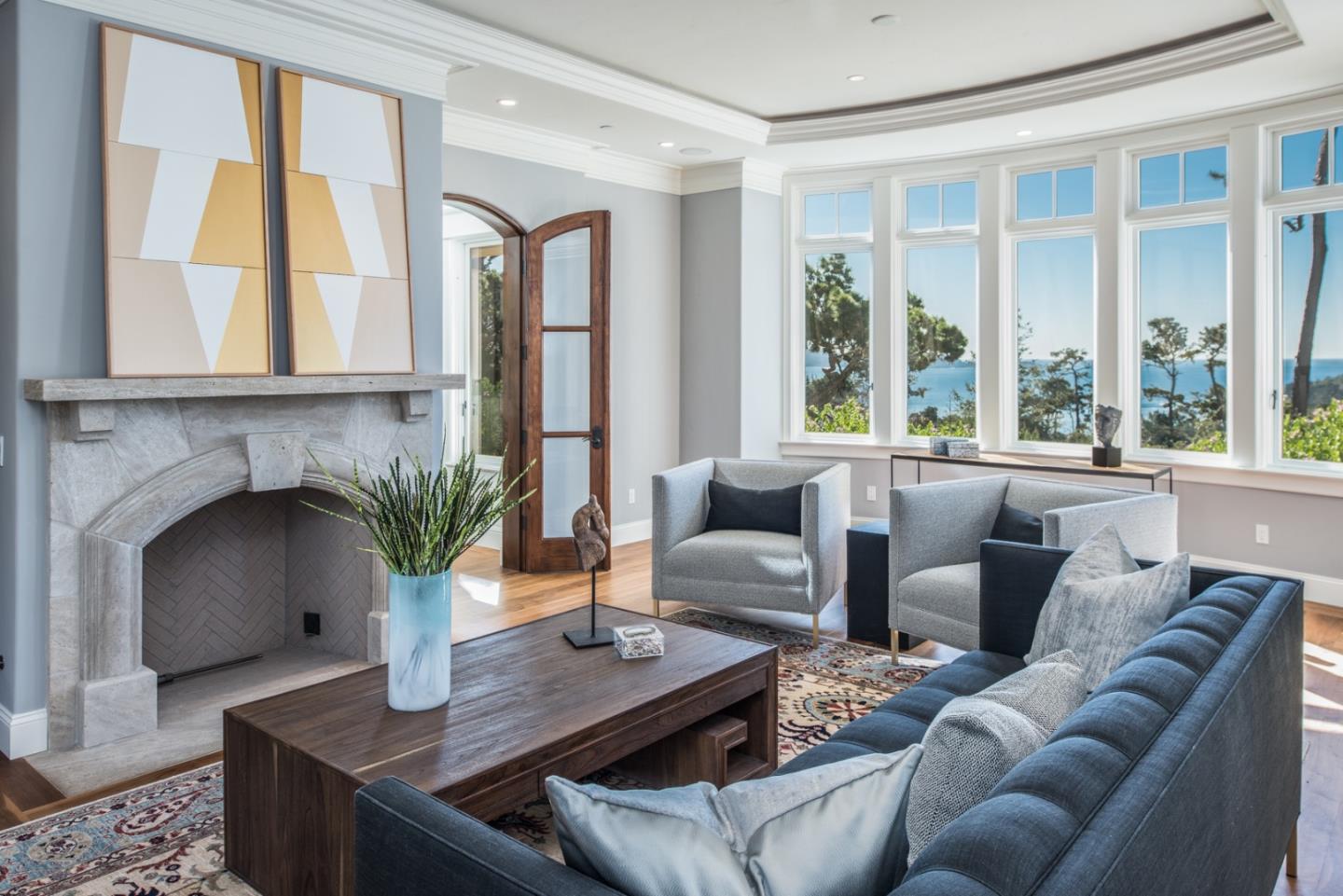 1451 Riata Road Pebble Beach, CA 93953 - Photo 4 of 18 a living room with furniture and a potted plant
