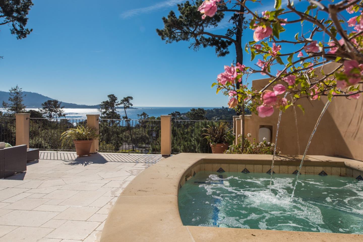 1451 Riata Road Pebble Beach, CA 93953 - Photo 8 of 18 a view of a house with a yard