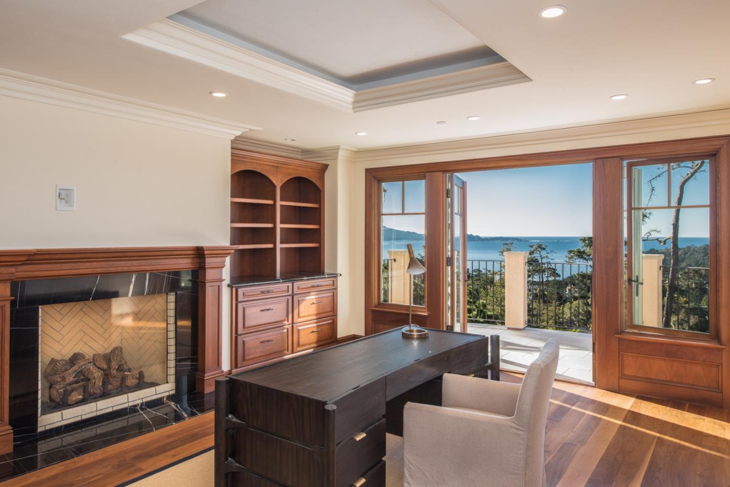 1451 Riata Road Pebble Beach, CA 93953 - Photo 9 of 18 a dining room with a large window and table