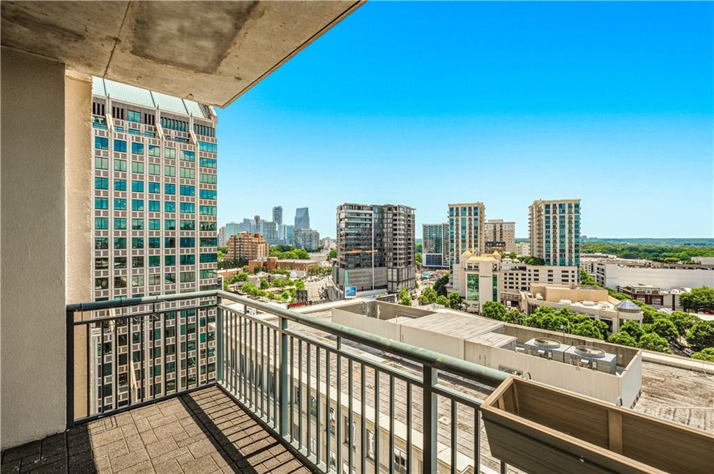 3040 Peachtree Road Northwest, Unit 1503 Atlanta, GA 30305 - Photo 26 of 38 a view of a balcony with city