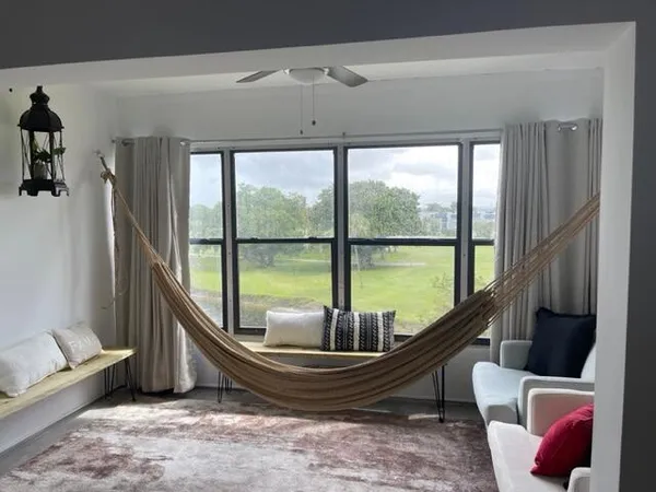 a room with furniture and a window