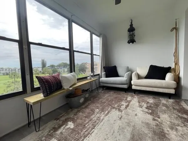 a bed room with a bed furniture and a window