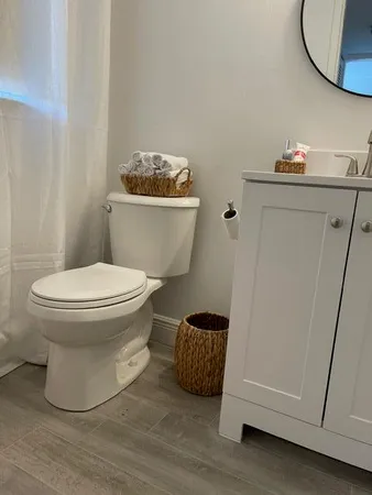 a living room with lots of furniture and a flat screen tv