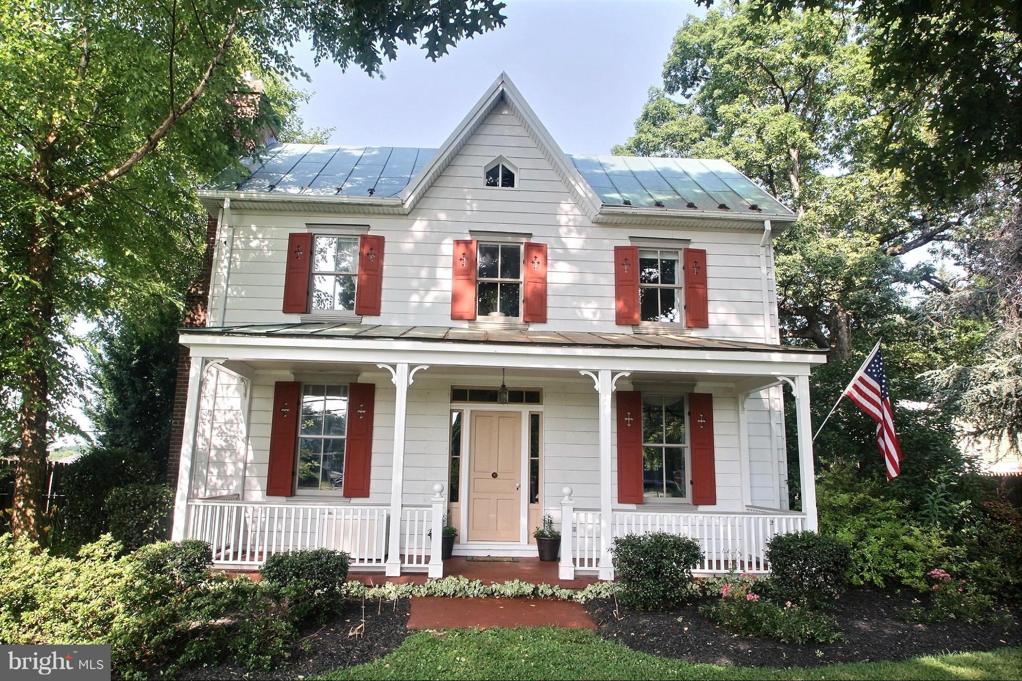 21404 Laytonsville Road Gaithersburg, MD 20882 - Photo 2 of 30 front view of a house with a yard
