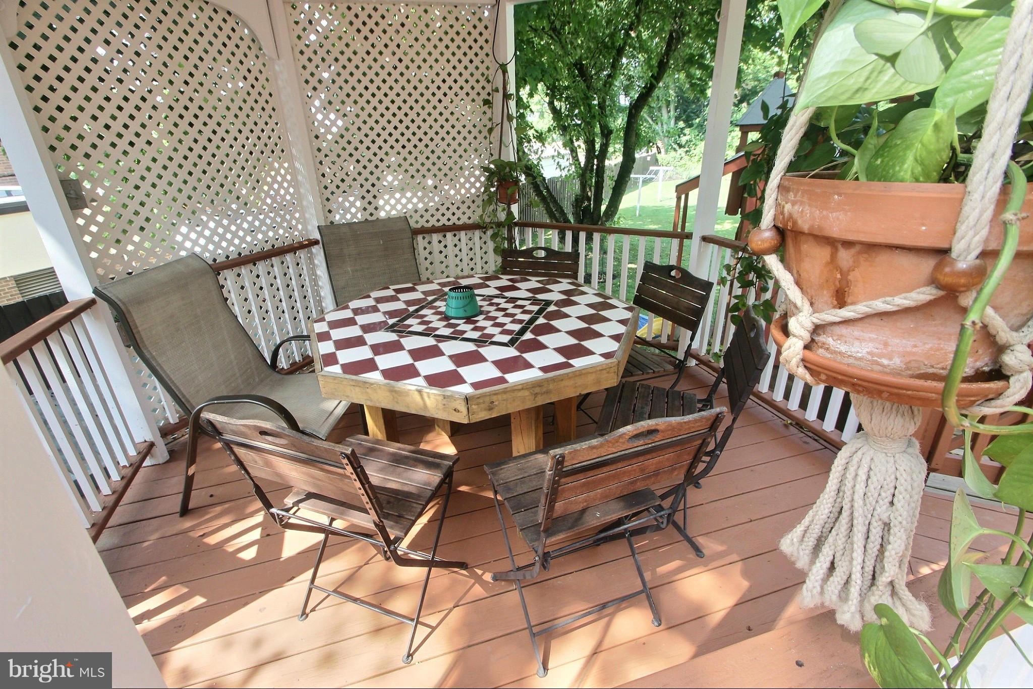 21404 Laytonsville Road Gaithersburg, MD 20882 - Photo 19 of 30 a view of an outdoor sitting area with brick walls