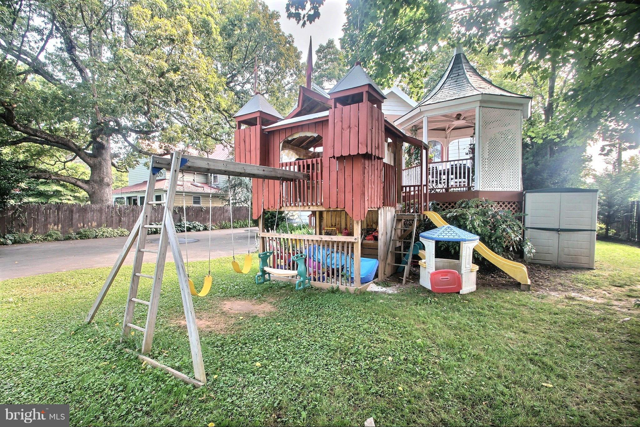 21404 Laytonsville Road Gaithersburg, MD 20882 - Photo 23 of 30 a view of a house with a yard patio and a slide