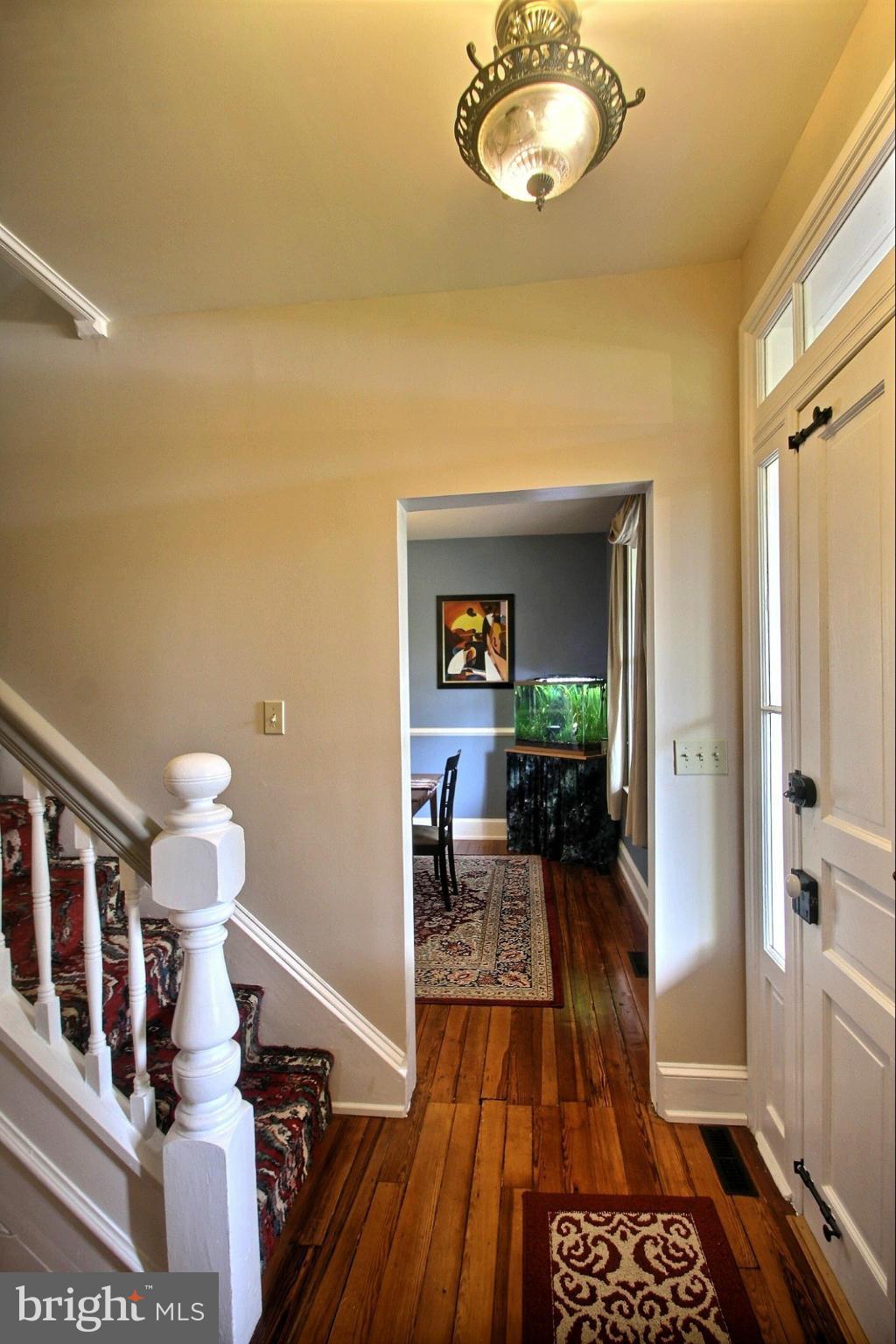 21404 Laytonsville Road Gaithersburg, MD 20882 - Photo 5 of 30 a view of a living room with a wooden floor