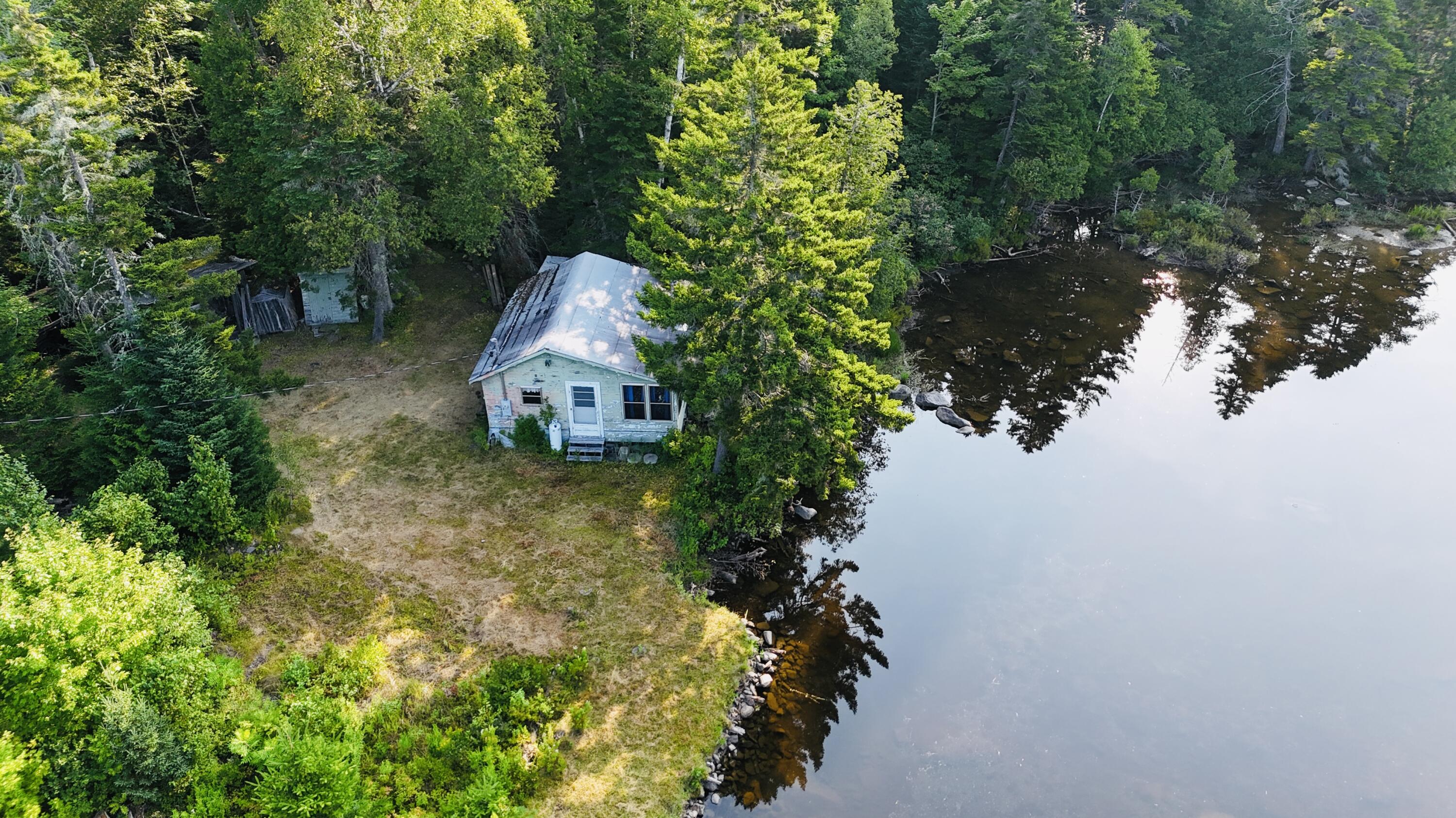 40 South South Brook Road Greenville, ME 04441 - Photo 1 of 31 dji_fly_20250810_080542_0998_17548277700