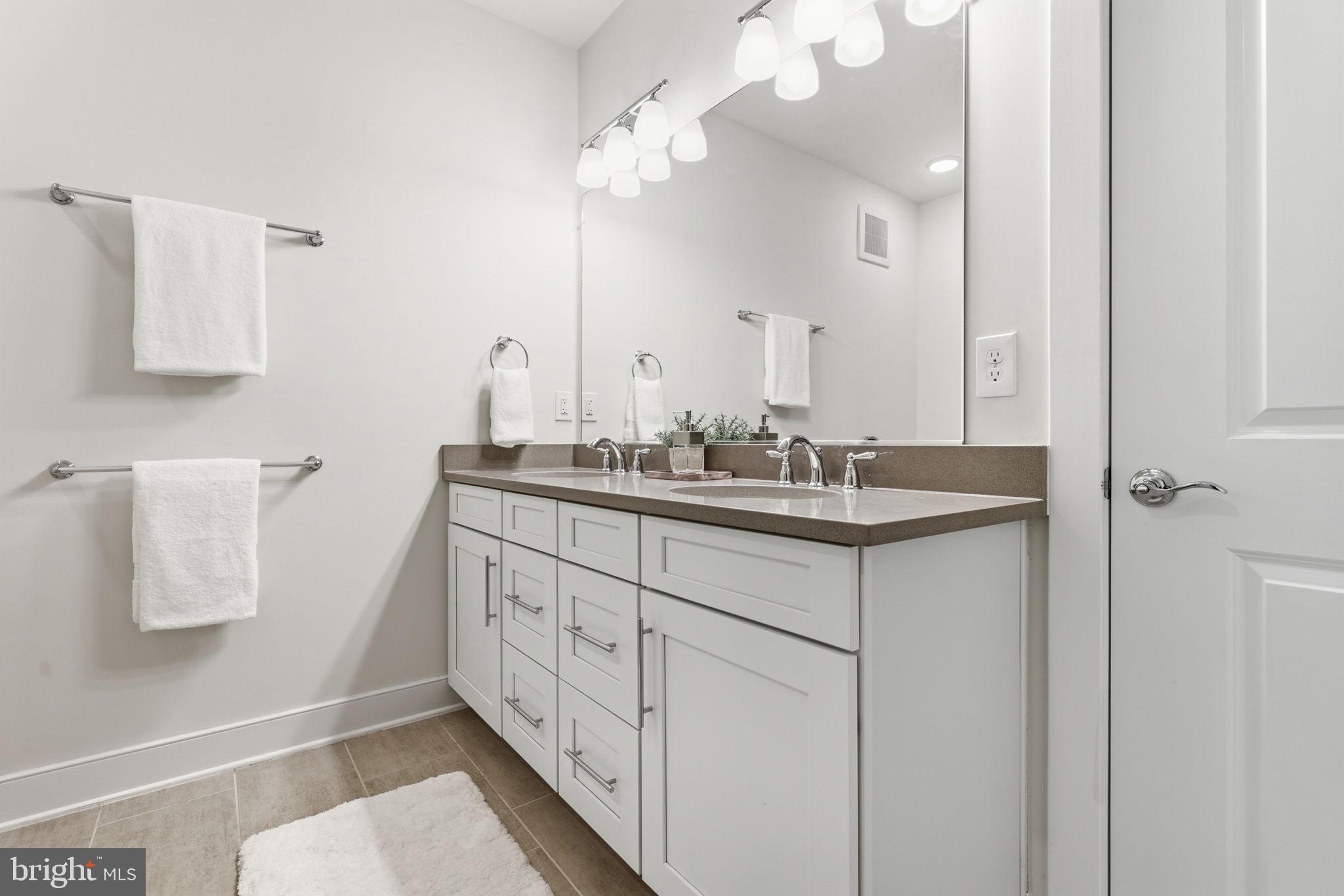 11200 Reston Station Boulevard, Unit 205 Reston, VA 20190 - Photo 21 of 39 Main Bathroom