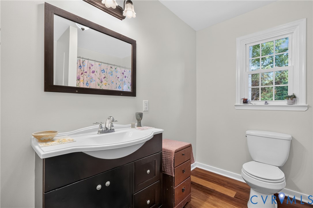 7248 Full Rack Drive Midlothian, VA 23112 - Photo 24 of 36 Bathroom featuring a dark wood-finish vanity with