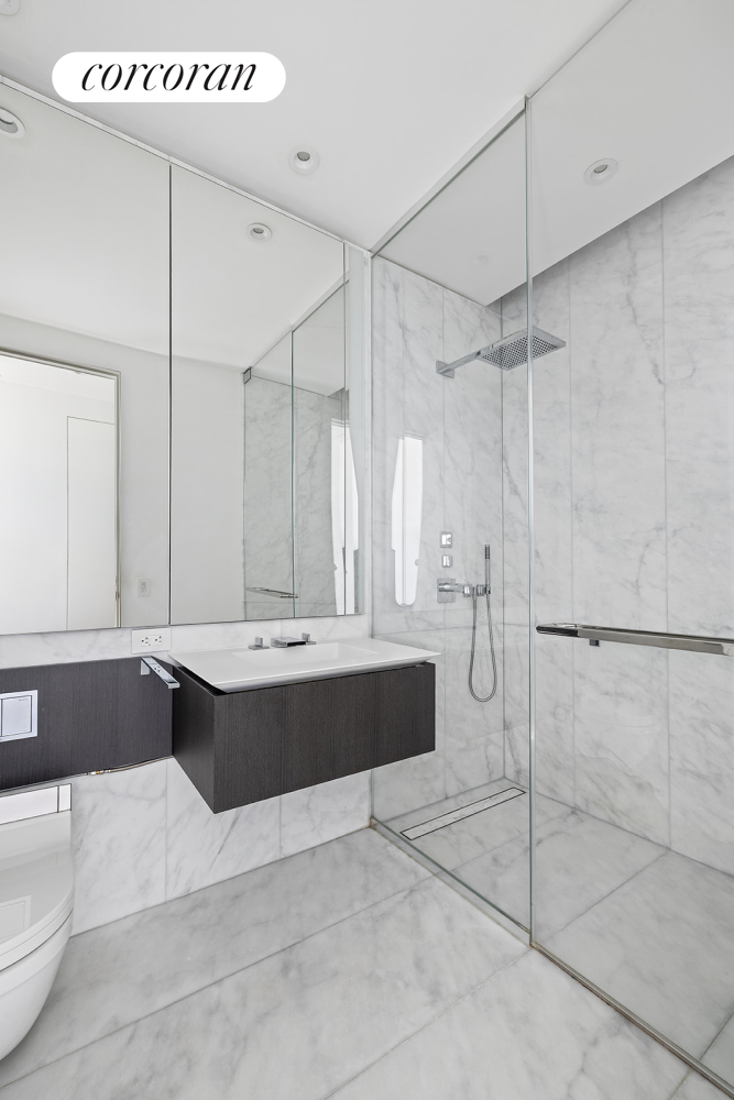 520 West 28th Street, Unit 29 Manhattan, NY 10001 - Photo 10 of 14 a spacious bathroom with a bathtub and shower