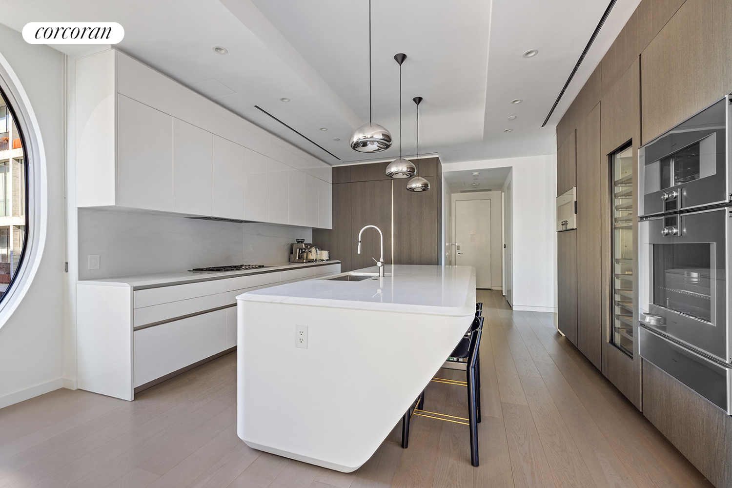 520 West 28th Street, Unit 29 Manhattan, NY 10001 - Photo 4 of 14 a kitchen with a sink stainless steel appliances a counter top space and cabinets