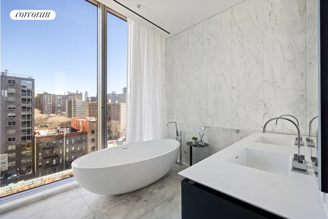 a bathroom with a bathtub and a sink